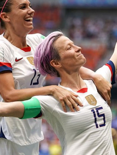 USWNT midfielder Megan Rapinoe (right)